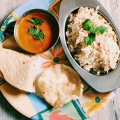 A picture of Jeera rice daal fry.