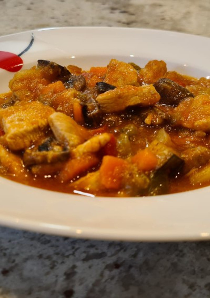 Una foto de Pisto de pavo y champiñones