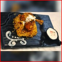 Hyderabadi Chicken Dum Briyani A picture of Hyderabadi Chicken Dum Briyani.