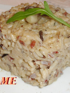 Una foto de Arroz variado con salsa de setas