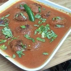 A picture of Bottle Gourd kofta curry.
