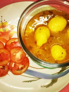 হিং আলু টমেটো দম (hing aloo tomato dum recipe in Bengali) রেসিপির প্রধান ছবি