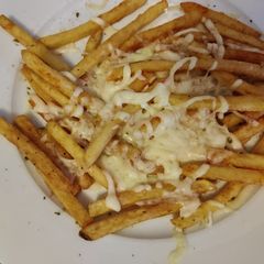 A picture of 3 spice cheesy garlic french fries.