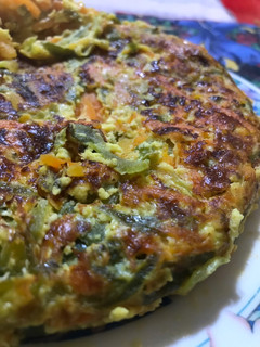 Una foto de Tortilla individual de zapallitos y zanahoria