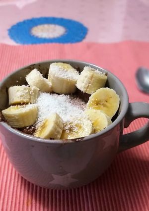 Una foto de Porridge de Cacao con Manzana, Plátano y Coco
