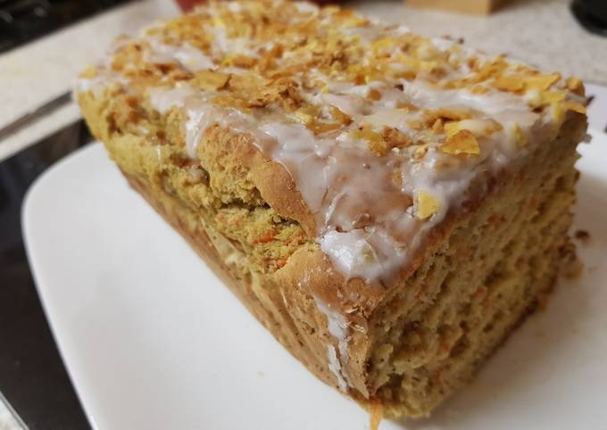 Carrot &amp; Banana Cake topped with icing and Banana crisp. 😀