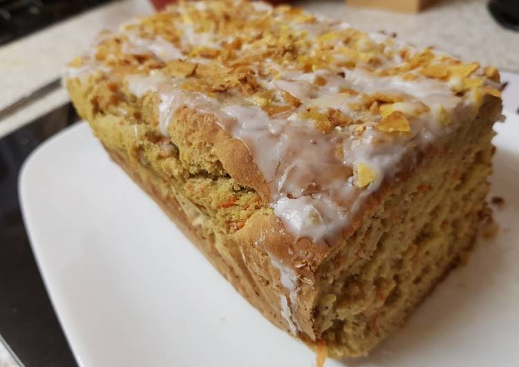 Carrot & Banana Cake topped with icing and Banana crisp. ๐