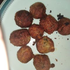 A picture of Onion covered balls.