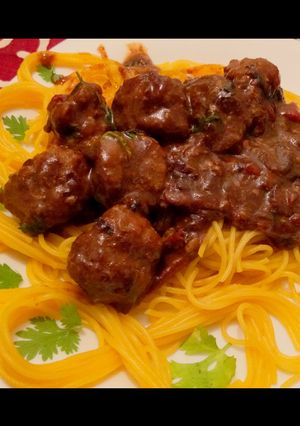 A picture of Spaghetti and Meatball sauce.