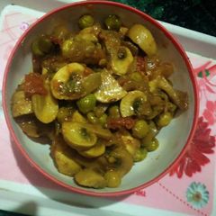 A picture of Mushrooms and peas.