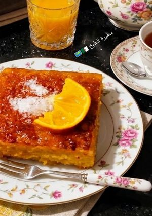 صورة لوصفة بسبوسة البرتقال 🍊 و جوز الهند 🥥