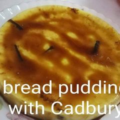Without oven bread pudding with Cadbury chocolate chunks A picture of Without oven bread pudding with Cadbury chocolate chunks.
