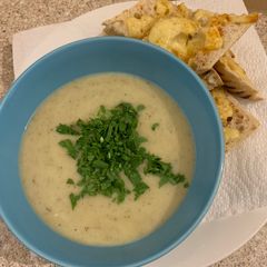A picture of Celariac & Apple soup finished with Rocket...Cheesy Paprika Ciabatta.