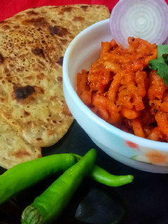 ગાંઠીયા નું શાક (Ganthiya Shak Recipe In Gujarati) રેસીપી મુખ્ય ફોટો