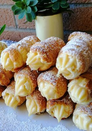 Foto di Cannoli di sfoglia con crema pasticcera