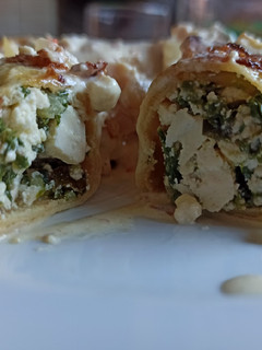 Una foto de Canelones de acelga y ricota