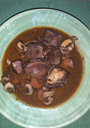 Una foto de Coq au Vin a Mi Manera