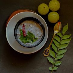 A picture of Nellikai Thayir Pachadi / Amla Raita / Indian Gooseberry Raita.