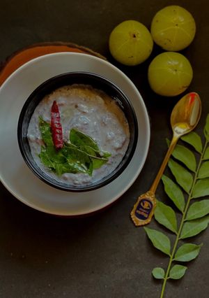 A picture of Nellikai Thayir Pachadi / Amla Raita / Indian Gooseberry Raita.
