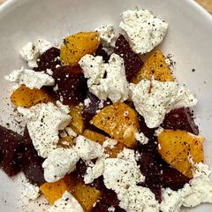 A picture of Chèvre, beet, and orange salad….