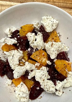 A picture of Chèvre, beet, and orange salad….
