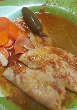 Una foto de tacos de cochinita pibil.
