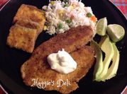 Una foto de filete de merluza en salsa