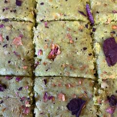 A picture of Badam pista barfi (almond and pistachio fudge.