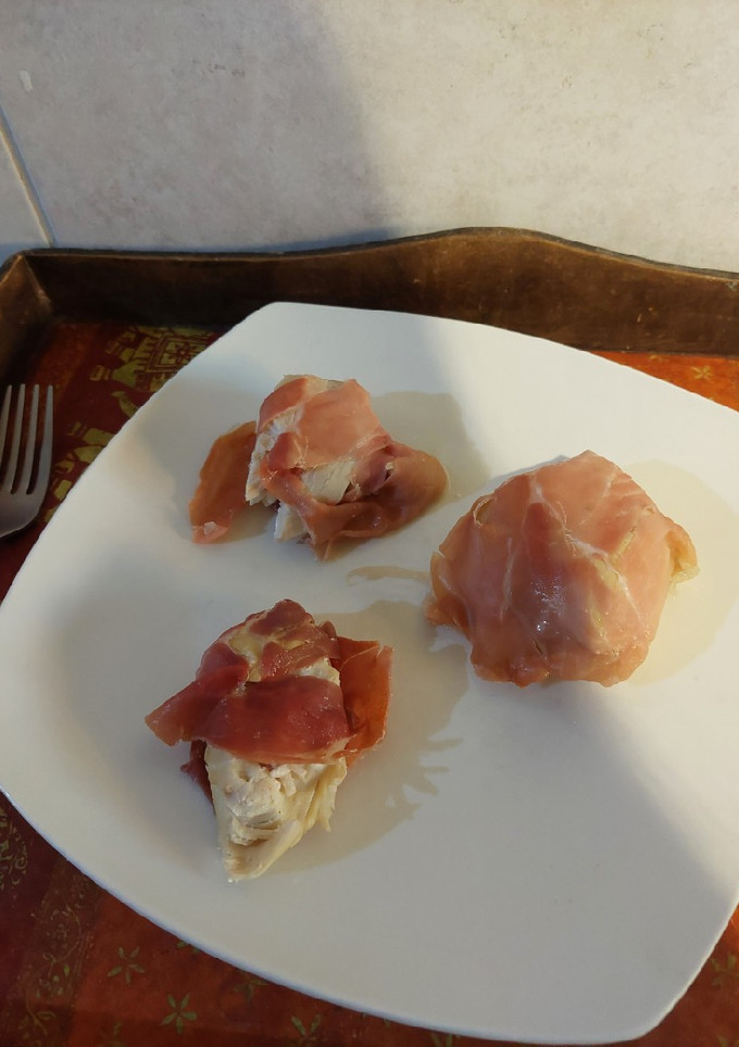 Una foto de Pollo relleno envuelto