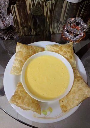 A picture of Chilled Mango Shake with homemade poriyan.