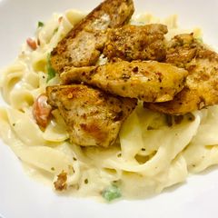 Grilled chicken with Fettuccine Alfredo A picture of Grilled chicken with Fettuccine Alfredo.
