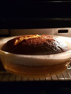 Una foto de Bizcocho de mandarina y chocolate 85%