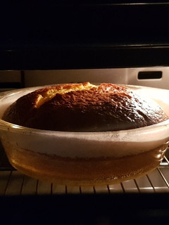 Una foto de Bizcocho de mandarina y chocolate 85%