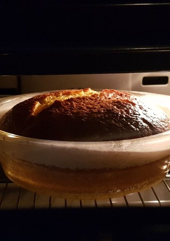 Una foto de Bizcocho de mandarina y chocolate 85%