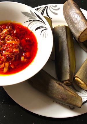 A picture of Palm oil sauce with plantain.