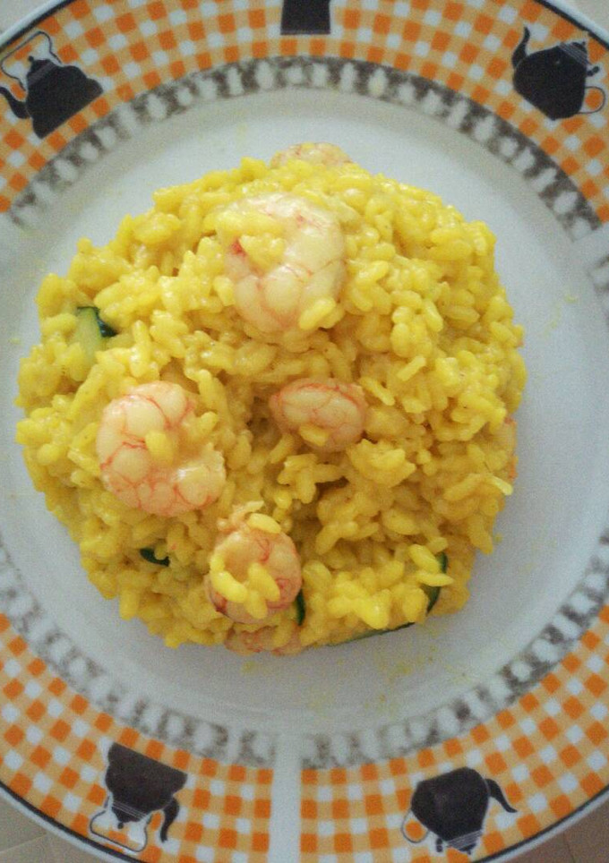 Una foto de Arroz con gambas y calabacín