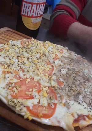 Una foto de Pizza