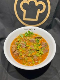 عکسی از دستور خورش نخود فرنگی لبنانی (یخنةالبازیلا)