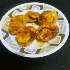 A picture of Boiled masala fried eggs.