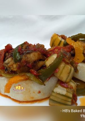 A picture of Garden egg sauce with fish.