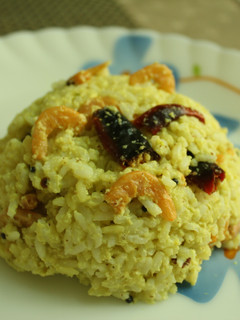 A picture of Prawns and coconut rice.