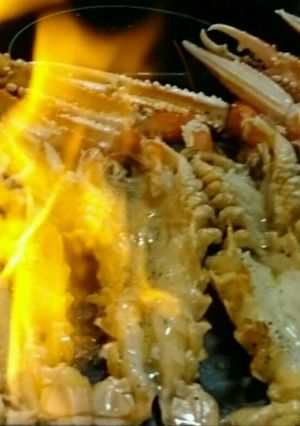 Una foto de Cigalas flambeadas con salsa de lima