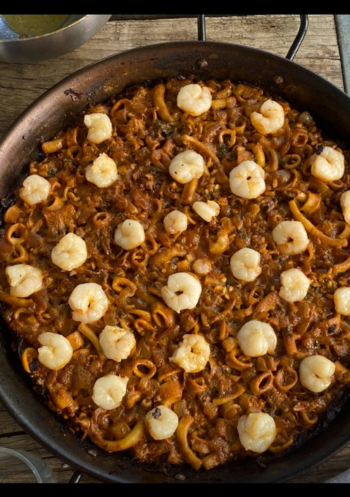 Una foto de Arroz seco de marisco