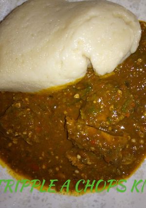 A picture of Tuwon semovita with okro soup.