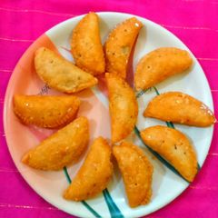 A picture of Gujiya..... dry fruits potli.