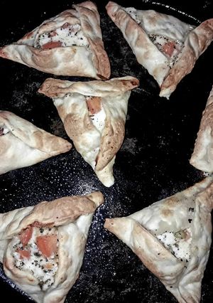 Una foto de Triangulitos caprese