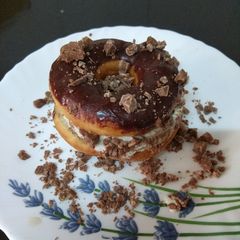 A picture of Homemade Chocolate Donut - Ice cream sandwich.