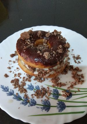 A picture of Homemade Chocolate Donut - Ice cream sandwich.