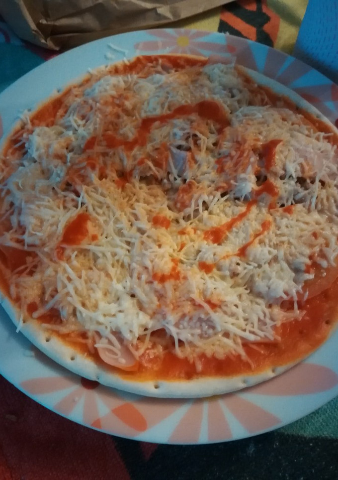 Una foto de Pizza de atún