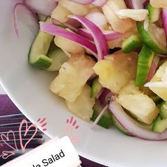 A picture of Pineapple Salad (best served with tomato rice).